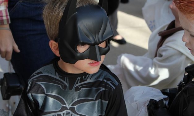 Children Are Happy With Toys or Candy at Halloween