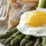 Fresh Asparagus Topped with Sunny-Side Up Eggs