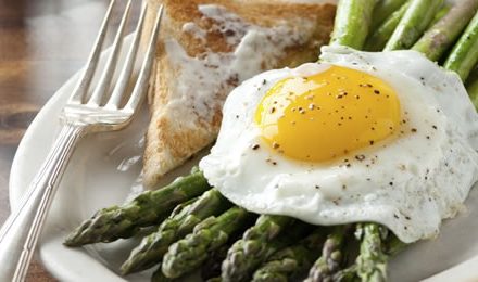 Fresh Asparagus Topped with Sunny-Side Up Eggs