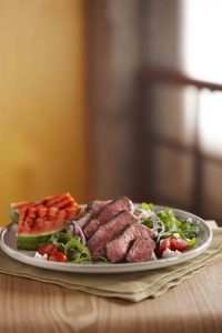 Grilled Steak and Watermelon Salad recipe photo from the Diabetic Gourmet Magazine diabetic recipes archive.