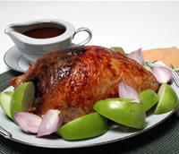 Walnut-Stuffed Turkey Breast with Cider Gravy recipe photo from the Diabetic Gourmet Magazine diabetic recipes archive.